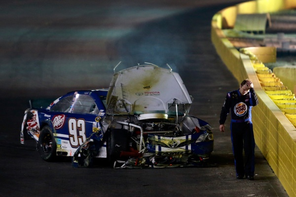 Bizarre: TV high-wire snaps midway through Charlotte's 600, creating havoc, and Kevin Harvick is the night's big winner, surviving the chaos