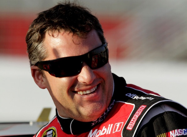 Tony Stewart still center stage in NASCAR, but this time for winning the Atlanta 500 pole